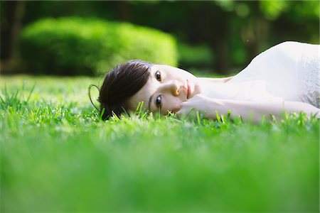 Young Woman Relaxing in Park Stock Photo - Rights-Managed, Code: 859-03782228