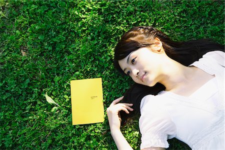 Young Woman Relaxing in Park Stock Photo - Rights-Managed, Code: 859-03782232