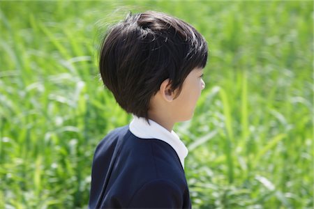 Japanese Boy Standing  in Park Stock Photo - Rights-Managed, Code: 859-03782279