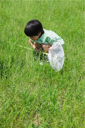 simsearch:859-03781982,k - Junge mit Fischnetz im Park Stockbilder - Lizenzpflichtiges, Bildnummer: 859-03782316