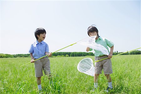 simsearch:859-03782413,k - Boys Playing with Fishing Nets Foto de stock - Con derechos protegidos, Código: 859-03782318