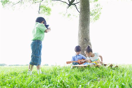 Friends Enjoying Together in Park Stock Photo - Rights-Managed, Code: 859-03782415