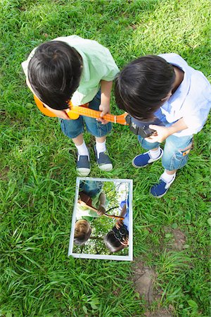 Twins Looking into Mirror Stock Photo - Rights-Managed, Code: 859-03782421