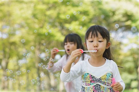 Girls Blowing Bubbles Stock Photo - Rights-Managed, Code: 859-03805782