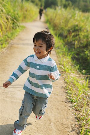 simsearch:859-03806233,k - Carefree Boy on Rural Path Stock Photo - Rights-Managed, Code: 859-03805811