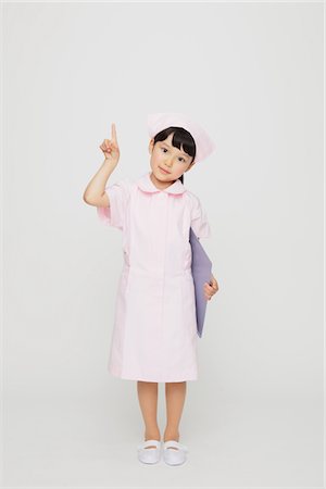 simsearch:859-03806050,k - Fille japonaise déguisée en infirmière Photographie de stock - Rights-Managed, Code: 859-03806091