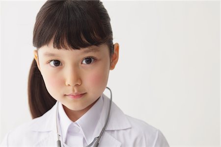 portrait medical white background not animal not smiling - Portrait of Girl Dressed Up As Doctor Stock Photo - Rights-Managed, Code: 859-03806131