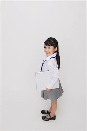 simsearch:695-05779428,k - Girl as Office Worker Holding Laptop Foto de stock - Con derechos protegidos, Código: 859-03806163