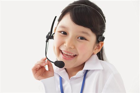 simsearch:859-03806184,k - Happy Girl Wearing Headset Stock Photo - Rights-Managed, Code: 859-03806174