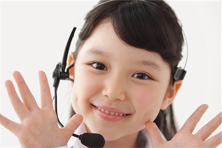 dimpled - Happy Girl Wearing Headset Stock Photo - Rights-Managed, Code: 859-03806170