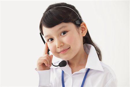 simsearch:859-03806184,k - Happy Girl Wearing Headset Stock Photo - Rights-Managed, Code: 859-03806171