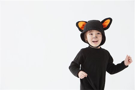 dressing up as a cat for halloween - Boy Dressed As Cat Costume Stock Photo - Rights-Managed, Code: 859-03806317