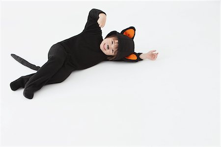plaisanter - Garçon habillé en Costume de chat Photographie de stock - Rights-Managed, Code: 859-03806320