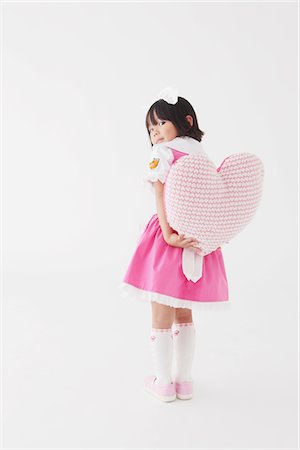 Japanese Girl Holding Heart Stock Photo - Rights-Managed, Code: 859-03806333