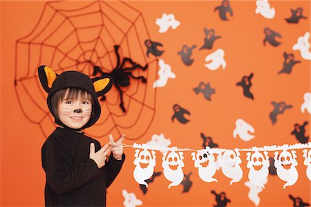 spider - Boy In Cat Costume for Halloween Stock Photo - Rights-Managed, Code: 859-03806353