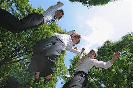 excited jumping suit - Businesspeople jumping Stock Photo - Rights-Managed, Code: 859-03807194