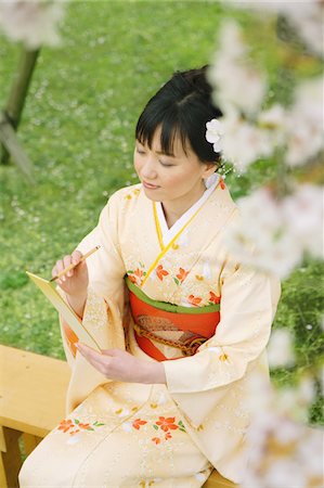 Japanese Woman in Kimono with Cherry Blossom Stock Photo - Rights-Managed, Code: 859-03811159