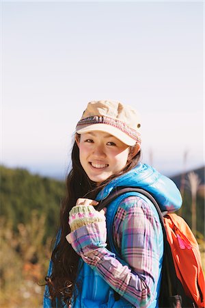 excited traveller - Young Woman Posing While Hiking Stock Photo - Rights-Managed, Code: 859-03839458