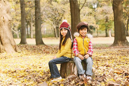 fallen leaf - Boy And Girl Sitting Under A Tree Stock Photo - Rights-Managed, Code: 859-03839635