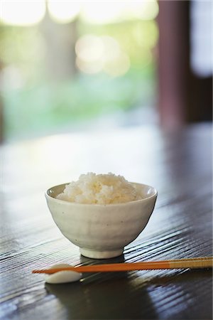 rice on chopstick - Bowl Of Rice And Chopsticks Stock Photo - Rights-Managed, Code: 859-03839754