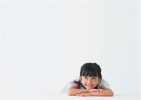 smile child asia - Small Girl Dreaming Stock Photo - Rights-Managed, Code: 859-03839791