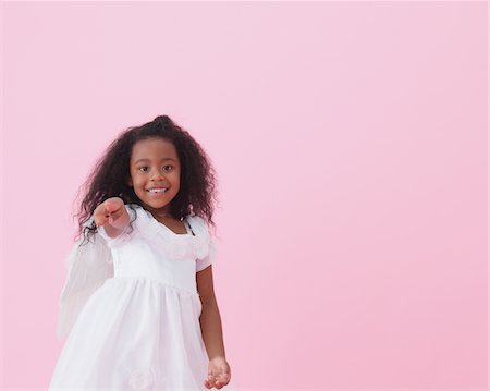 simsearch:859-03839780,k - Multiracial Girl Pointing Stock Photo - Rights-Managed, Code: 859-03839805