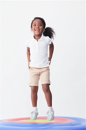 Multiracial Little Girl Jumping Stock Photo - Rights-Managed, Code: 859-03839818