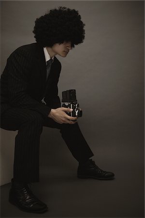 Portrait Of A Multiracial Young Man Posing In A Studio Stock Photo - Rights-Managed, Code: 859-03839968