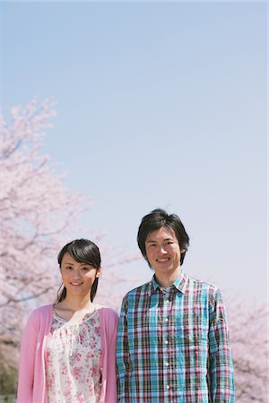 Young Couple in Front of Cherry blossoms Stock Photo - Rights-Managed, Code: 859-03840169