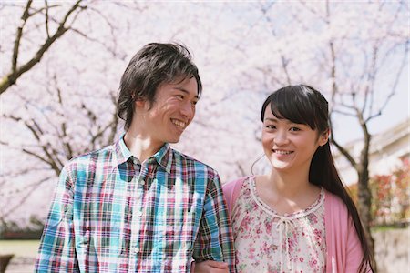 Young Couple under the Cherry blossoms Stock Photo - Rights-Managed, Code: 859-03840200