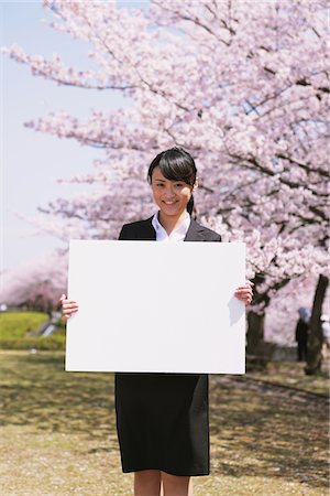Businesswoman Holding White Board Stock Photo - Rights-Managed, Code: 859-03840229