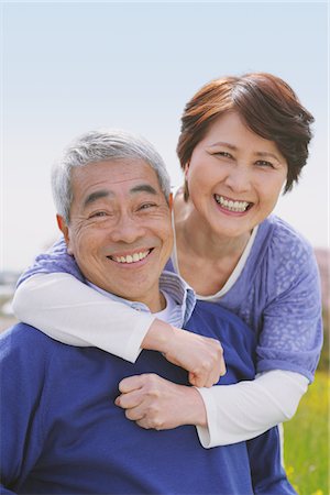 Middle-Aged Couple Arms Around And Smiling Stock Photo - Rights-Managed, Code: 859-03840309