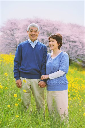 simsearch:859-03840315,k - Middle-Aged Couple Standing In Flowerbed Stock Photo - Rights-Managed, Code: 859-03840314