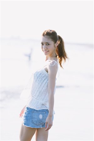 simsearch:859-03860564,k - Young Woman Walking At Seaside Stock Photo - Rights-Managed, Code: 859-03840424