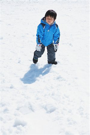 Young Boy Standing In Snow Stock Photo - Rights-Managed, Code: 859-03840614