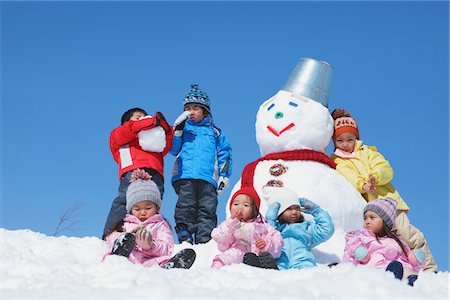 Children With Snowman In The Snow Stock Photo - Rights-Managed, Code: 859-03840659