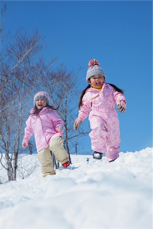 Sisters Playing In Snow Stock Photo - Rights-Managed, Code: 859-03840681