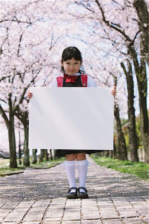 Girl Holding Whiteboard Stock Photo - Rights-Managed, Code: 859-03840765