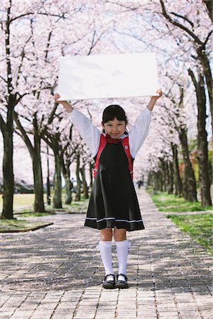 Girl Holding Whiteboard Stock Photo - Rights-Managed, Code: 859-03840766