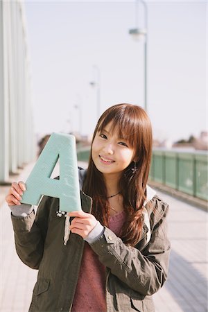 Japanese Women Holding Letter A Stock Photo - Rights-Managed, Code: 859-03860539