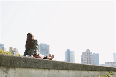 Japanese Women Relaxing On Wall Stock Photo - Rights-Managed, Code: 859-03860593