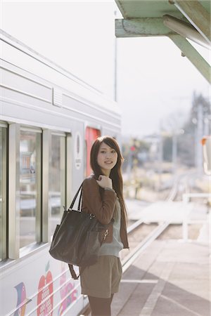 Young Woman On Platform Stock Photo - Rights-Managed, Code: 859-03860699