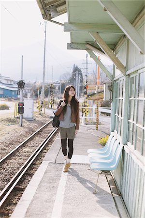 simsearch:859-03755500,k - Pretty Young Woman At Train Station Stock Photo - Rights-Managed, Code: 859-03860702