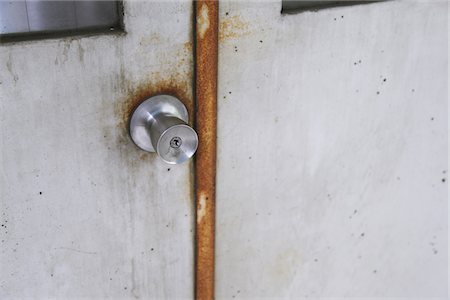 Close Up Of Steel Door Lock Fotografie stock - Rights-Managed, Codice: 859-03860737