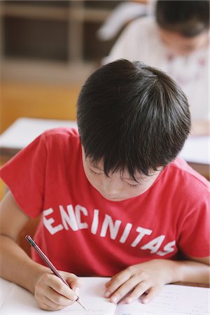 studying young asian boy - Student Learning In Classroom Stock Photo - Rights-Managed, Code: 859-03860801