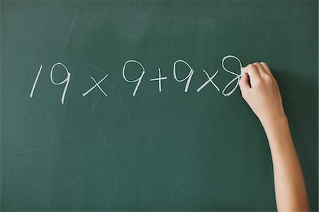 Human Hand Solving Math Problem Stock Photo - Rights-Managed, Code: 859-03860821