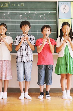 pictures of kids and friends playing at school - Children In Music Class Playing Flute Stock Photo - Rights-Managed, Code: 859-03860847