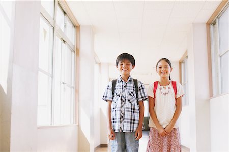 ethnic boy backpack - School Friends Standing Together In Corridor Stock Photo - Rights-Managed, Code: 859-03860868