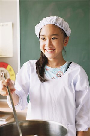 Girl Preparing Food In Classroom Stock Photo - Rights-Managed, Code: 859-03860899