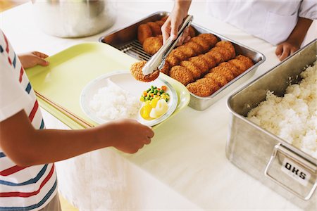 servicio de banquetes - Student Serving Food Foto de stock - Con derechos protegidos, Código: 859-03860893